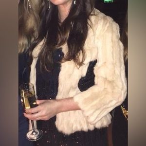 100% dyed rabbit fur jacket. Peach color, great condition